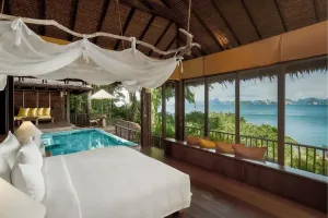 camera-da-letto-resort-lusso-tailandia-piscina-e-vista-mare